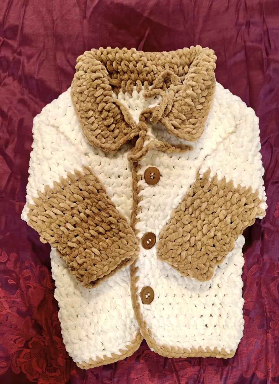 Pink crochet clutch bag