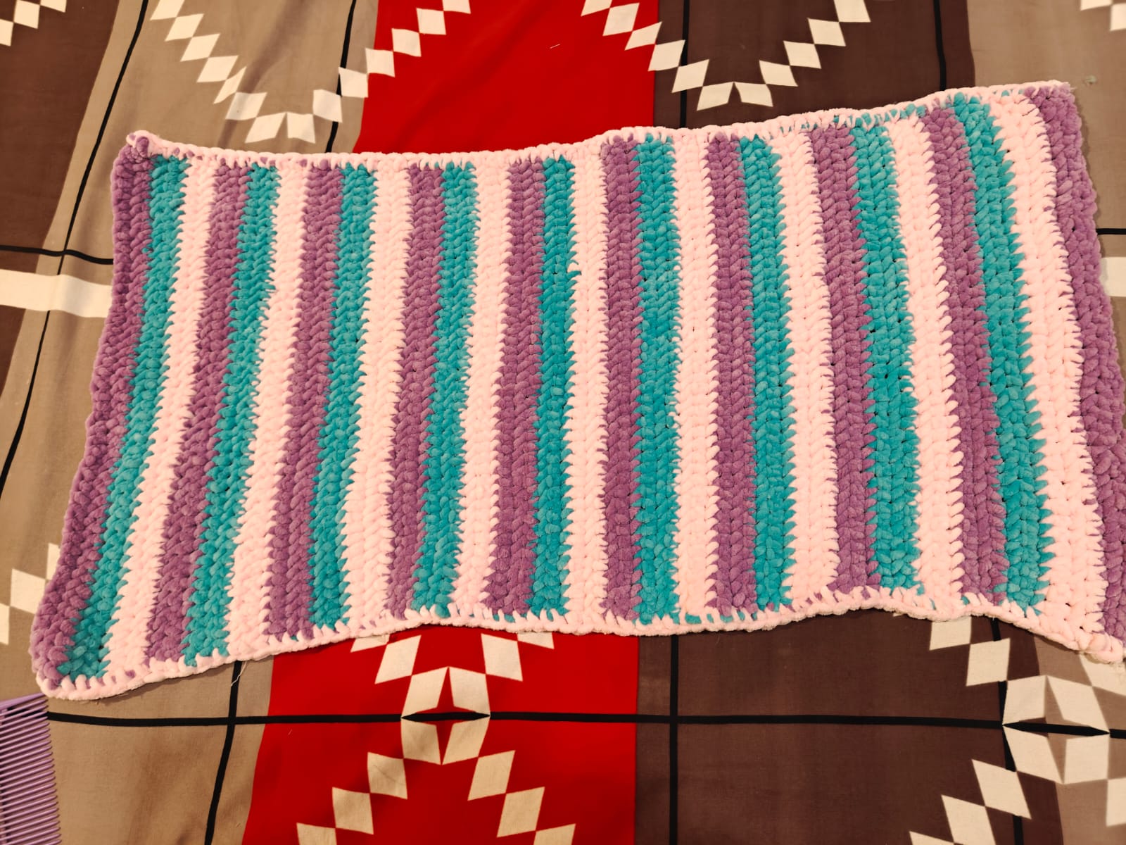 Striped crochet blanket